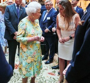 Lizzie Jones Operations Director and Her Majesty Queen Elizabeth II