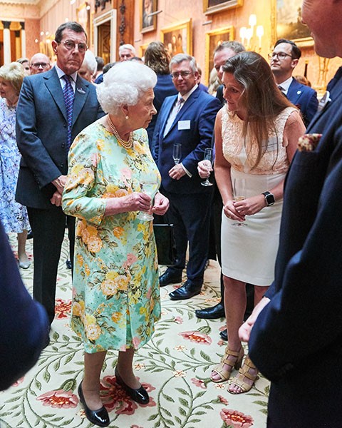 Lizzie Jones Operations Director and Her Majesty Queen Elizabeth II